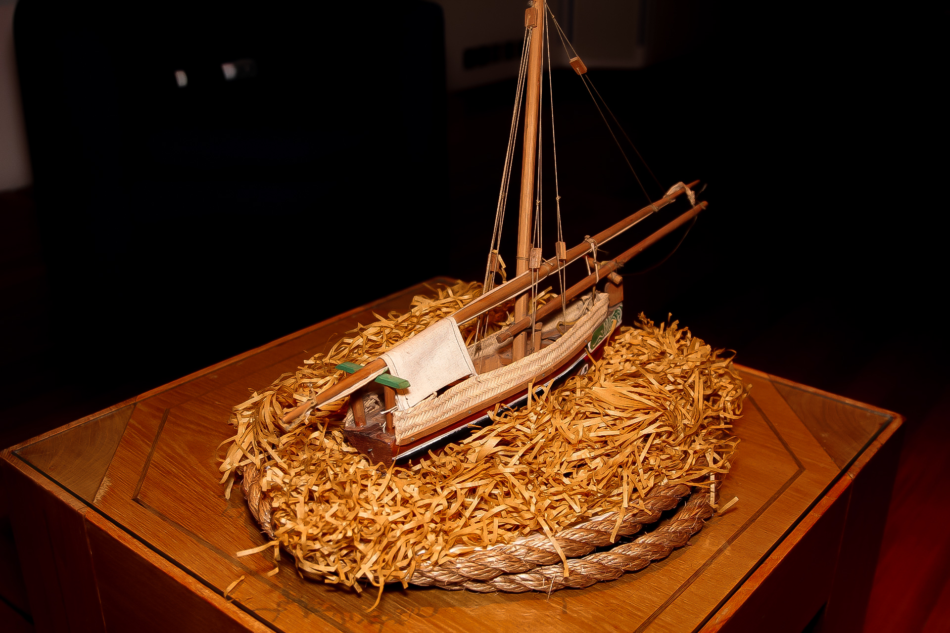 A model sailing boat used as a table centrepiece at the launch