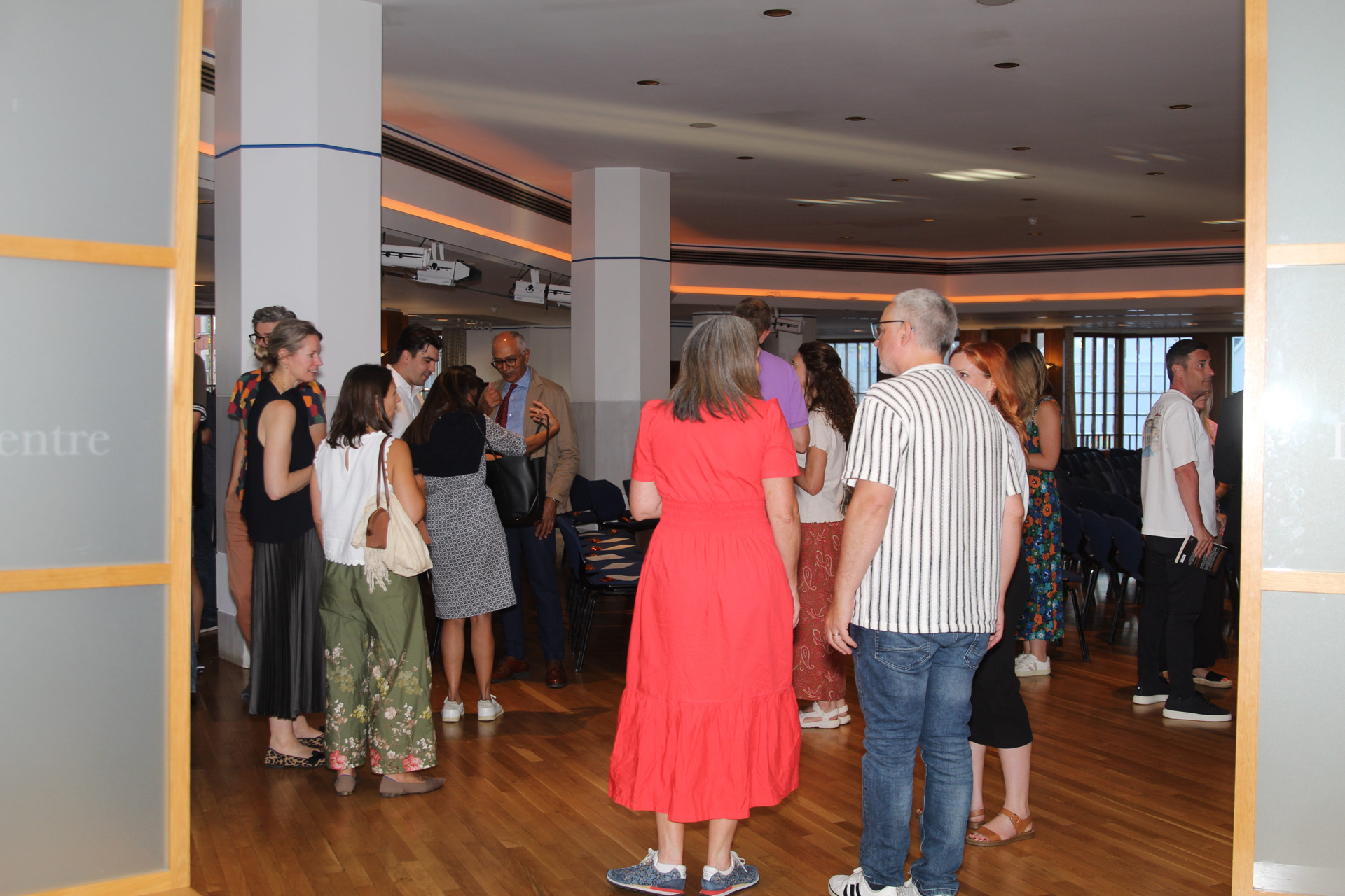 Guests arriving at the London launch, before the talk