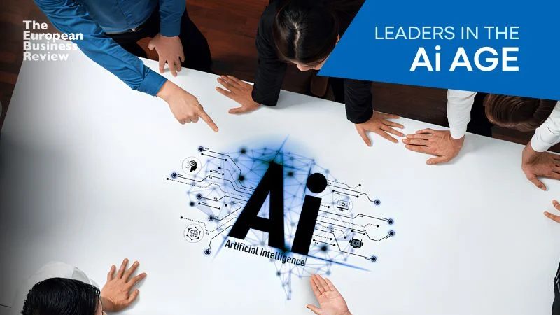The European Business Review cover image for Leaders in the AI Age, a group around a table marked Artificial Intelligence